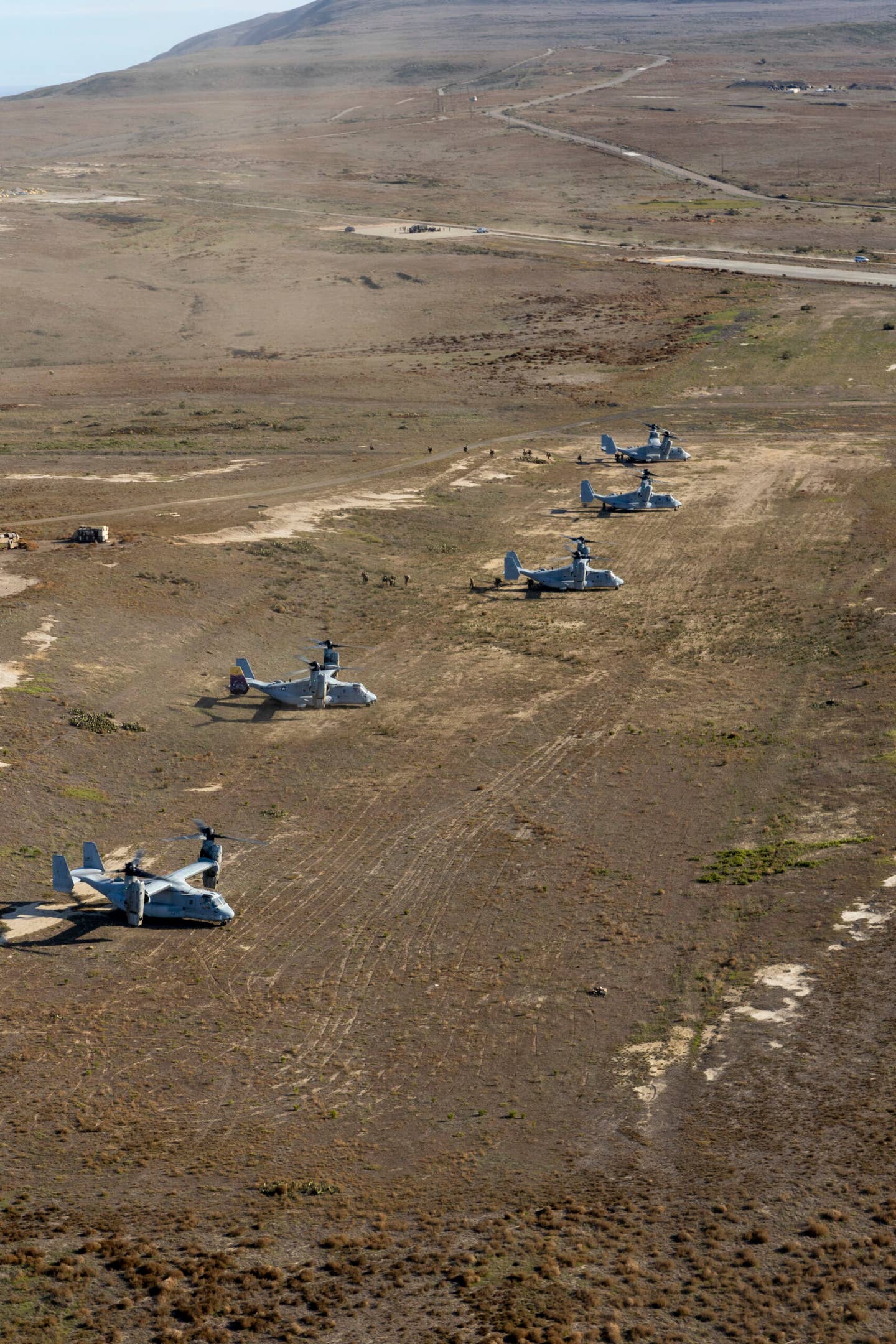 U.S. Marine Corps MV-22B Ospreys with Marine Aircraft Group 39, 3rd Marine Aircraft Wing (MAW), land on San Clemente Island, California, Dec. 3, 2022, during an air assault as part of Exercise Steel Knight 23. (U.S. Marine Corps photo by Lance Cpl. Isaac Velasco)