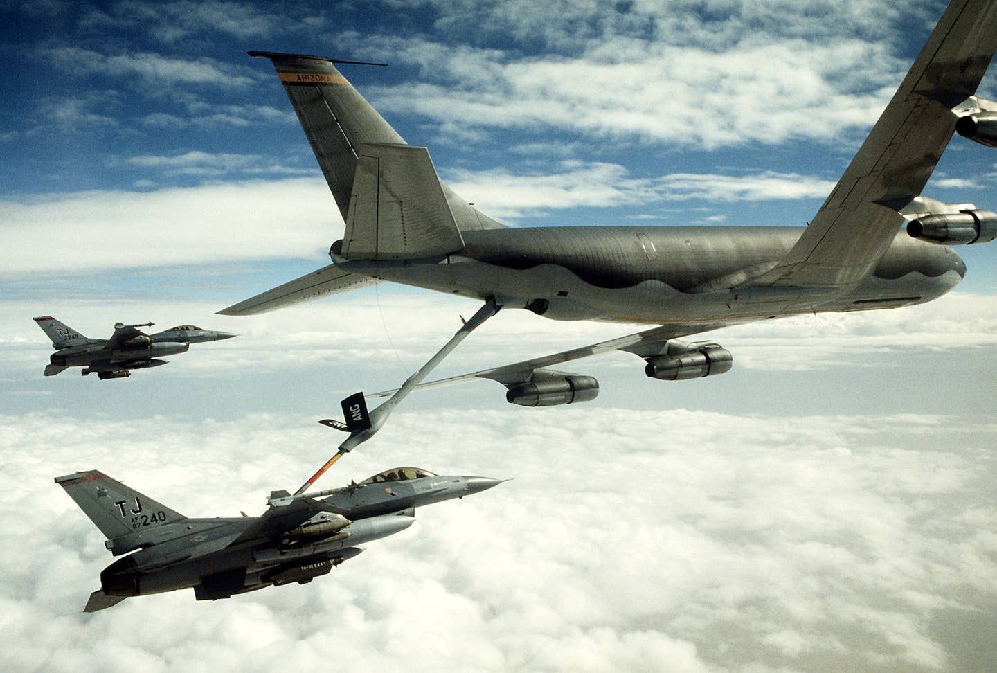 A 401st Tactical Fighter Wing F-16C refuels from a KC-135 Stratotanker as another F-16 stands by during Operation Desert Storm, February 1, 1991. <em>USAF image by Staff Sgt. Lee F. Corkran</em>