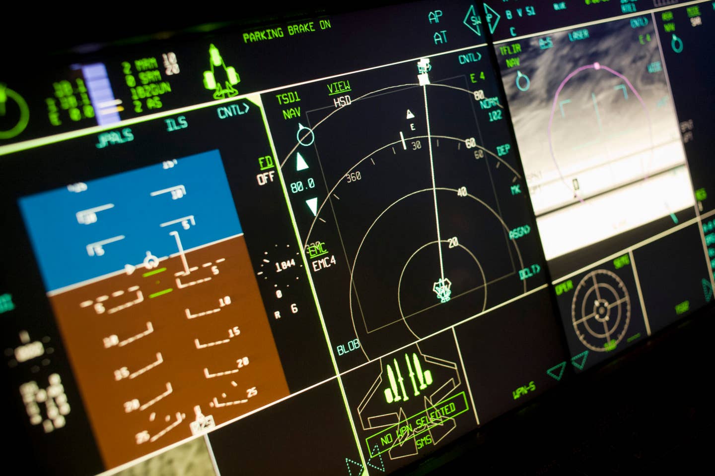 Glowing cockpit instrumentation of a Lockheed Martin F-35 Lightning II stealth fighter. <em>Credit: Photo by In Pictures Ltd./Corbis via Getty Images</em>