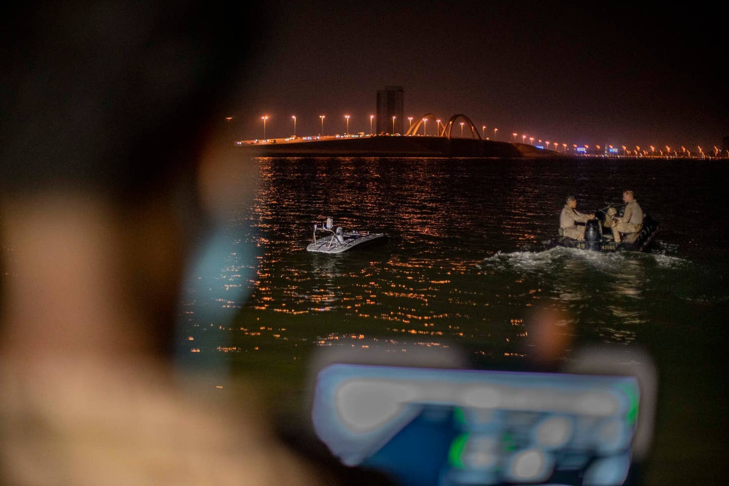 Marines assigned to the All Domain Reconnaissance Detachment, 11th Marine Expeditionary Unit, operate a MANTAS T12 USV during training with Task Force 59 at Naval Support Activity Bahrain, Oct. 28, 2022. <em>Credit: U.S. Marine Corps photo by Sgt. Seth Rosenberg</em>