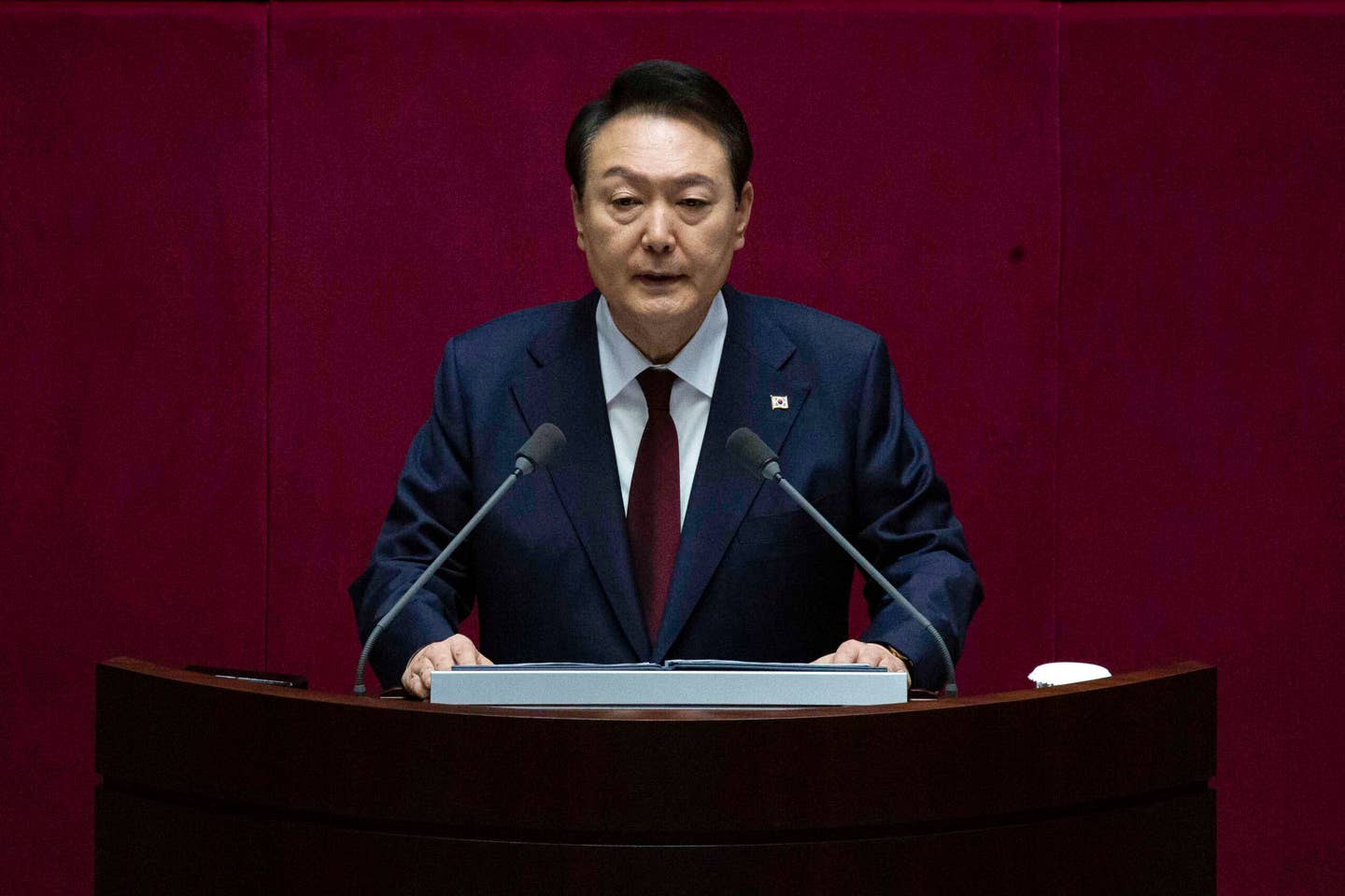 South Korean President Yoon Suk Yeol delivers a speech at the National Assembly in Seoul in October 2022. <em>Photo by JEON HEON-KYUN/POOL/AFP via Getty Images</em>