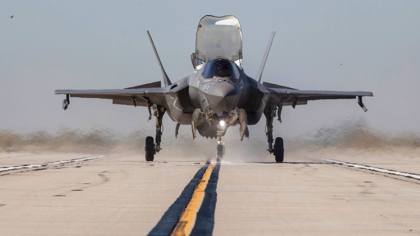An F-35B Lightning II with Marine Fighter Attack Squadron (VMFA) 122, Marine Aircraft Group 13, 3rd Marine Aircraft Wing, conducts a vertical landing at Marine Corps Air Station Yuma, Arizona, April 6, 2021. 3rd MAW and I Marine Expeditionary Force continue to pave the road for the rest of the Marine Corps by providing relevant training with real-world applications to develop recognition primed decision-making in preparation for future conflicts. (U.S. Marine Corps photo by Lance Cpl. Rachaelanne Woodward)