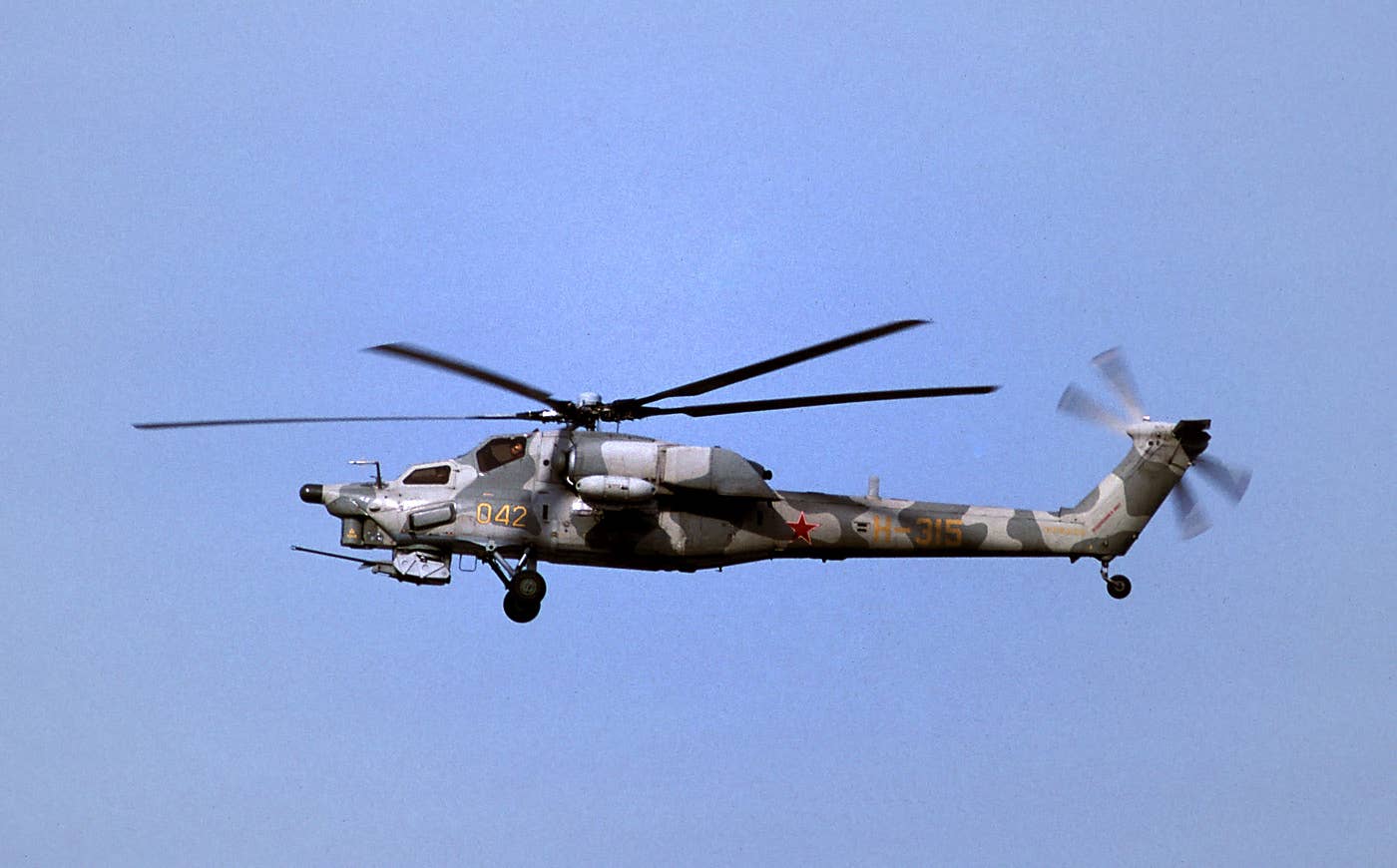First flown in 1988, the slightly improved Mi-28A added a new X-type tail rotor, redesigned engine exhausts, improved sensors, and self-defense devices. It was abandoned in favor of the night-capable Mi-28N. <em>Rob Schleiffert/Wikimedia Commons</em>