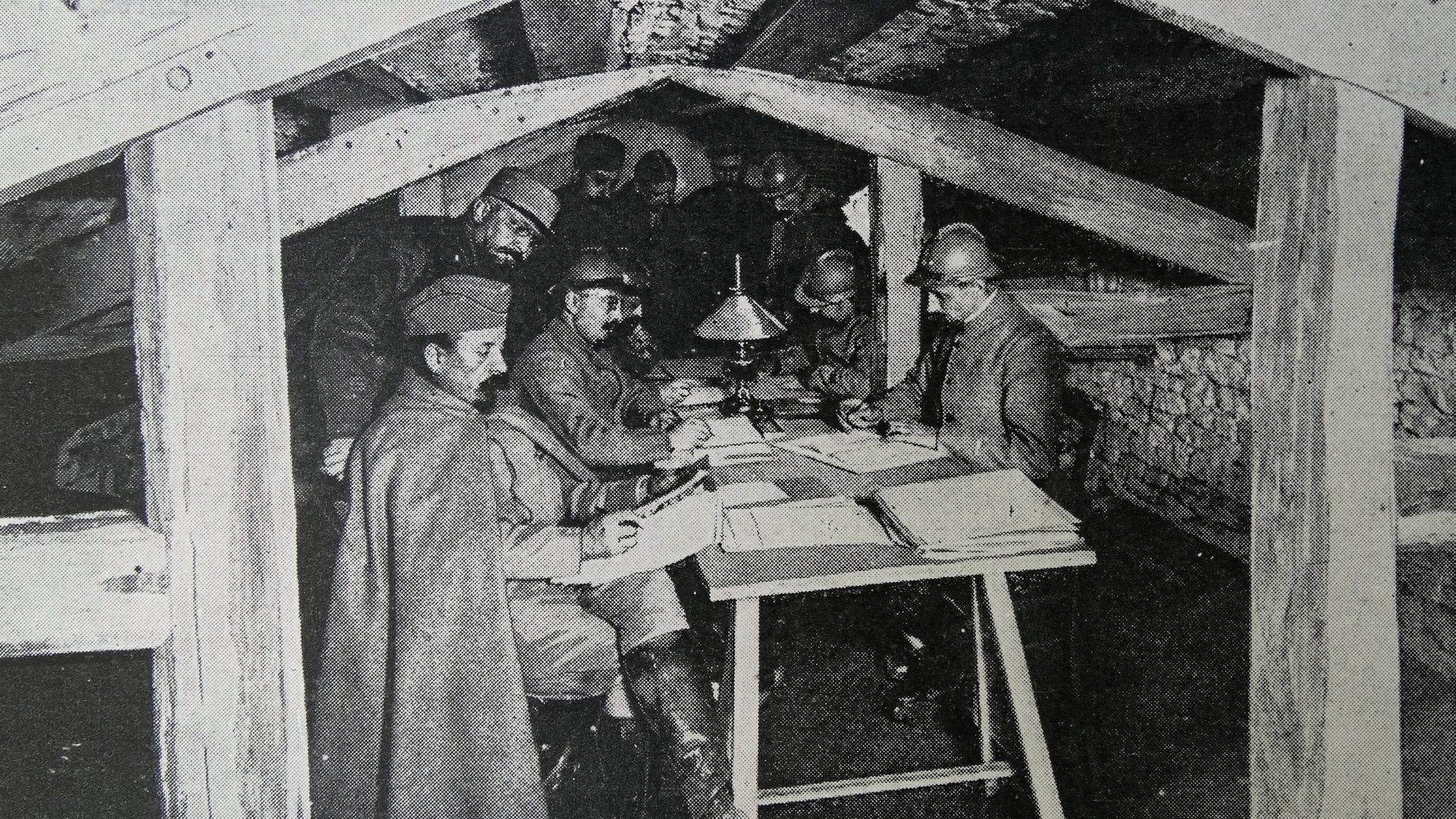 French officers in an underground HQ on the western front, during WWI.