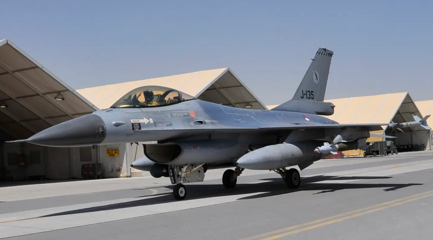 Armed with laser-guided bombs, a Royal Netherlands Air Force F-16 taxies down the flight line at Kandahar Airfield, Afghanistan.&nbsp;<em>U.S. Air Force/Sgt. Richard Andrade</em>