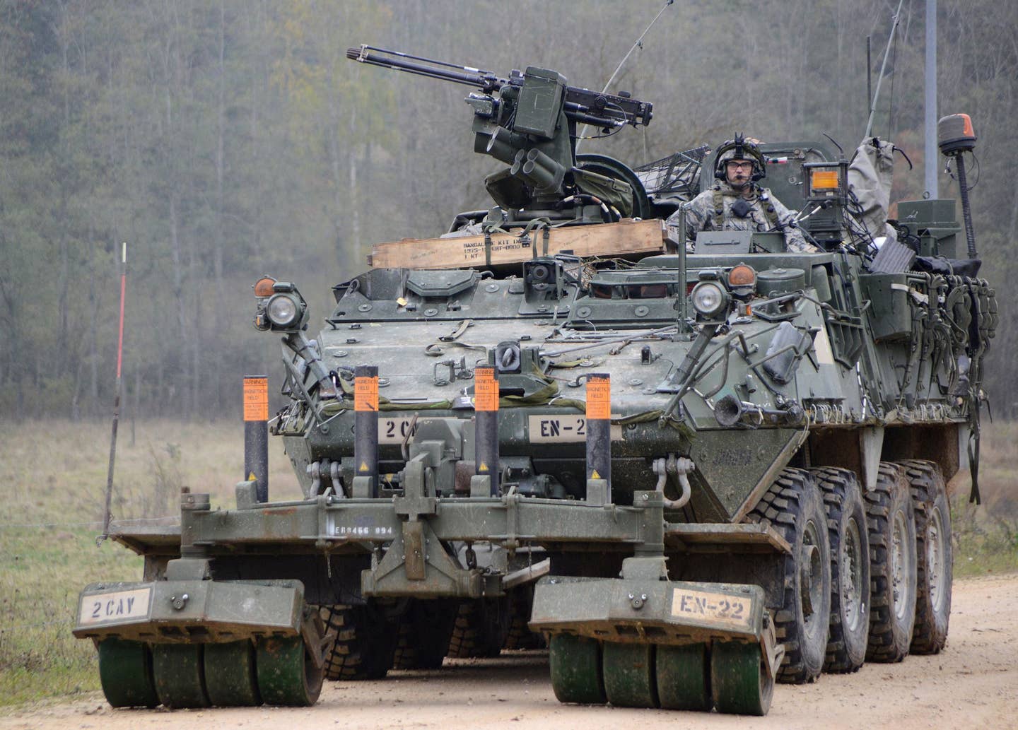 A U.S. Army M1132 Stryker Engineer Squad Vehicle equipped with a mine roller. <em>U.S. Army</em>