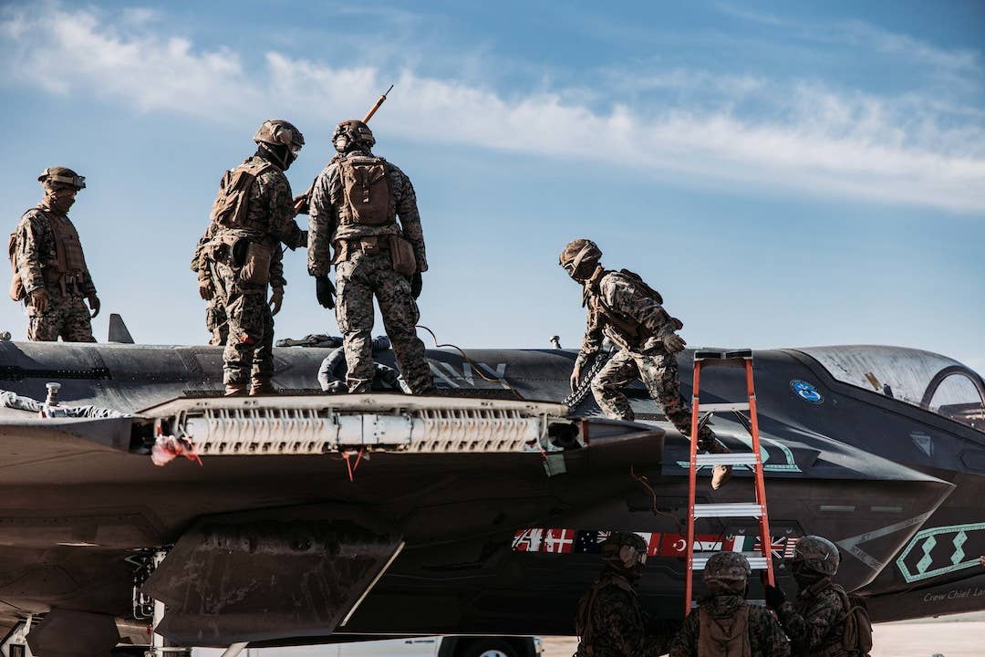 U.S. Marines with Combat Logistics Battalion (CLB) 24, Combat Logistics Regiment 2, 2nd Marine Logistics Group, prepare CF-01 for Helicopter Support Team operations. <em>U.S. Marine Corps photo by Cpl. Meshaq </em><i>Hilton</i>