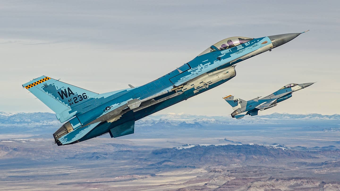 Aggressor F-16Cs flying in the NTTR. <em>Jamie Hunter</em>