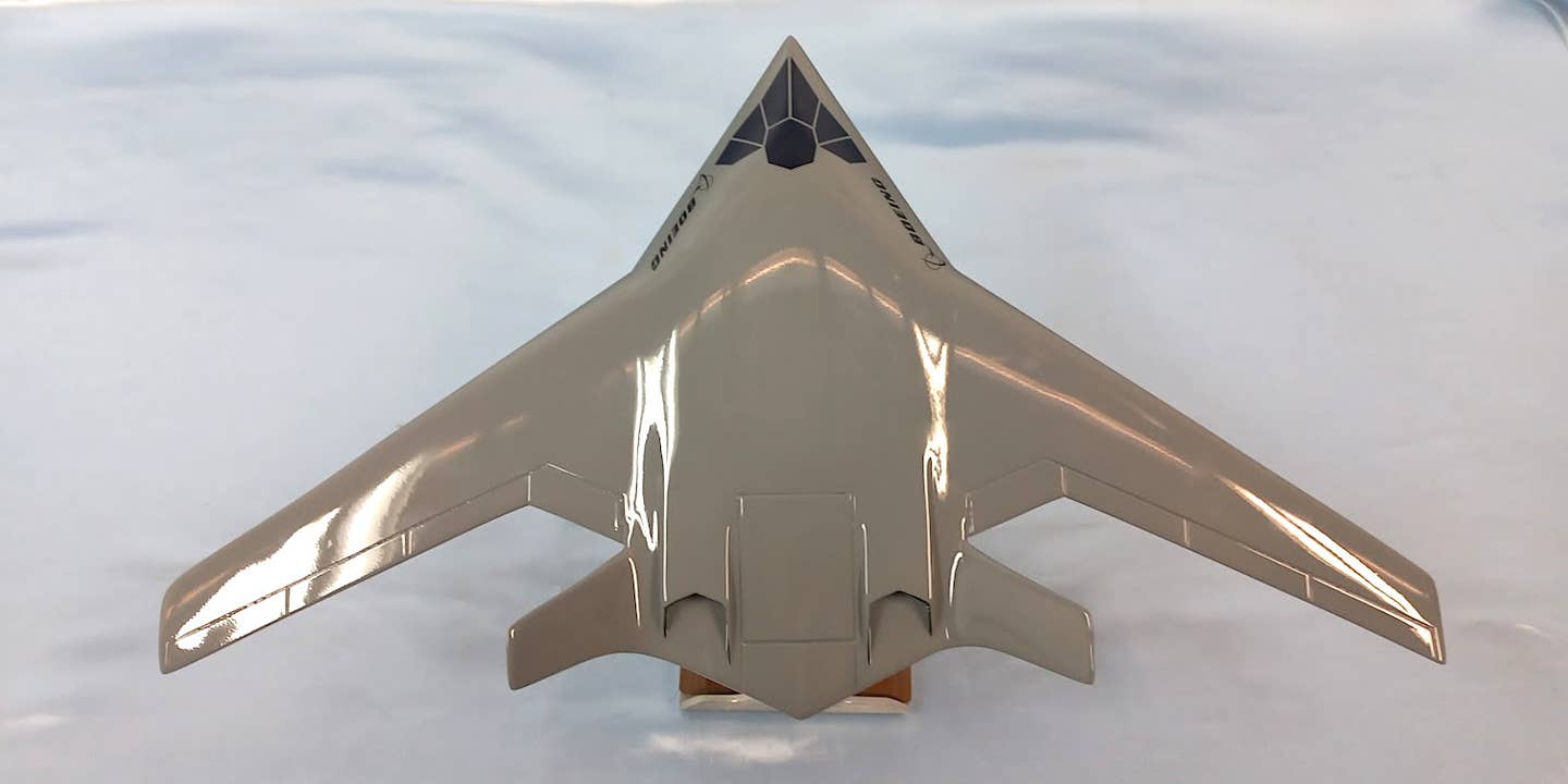 A rear view of the smaller model of Boeing's new stealthy BWB design concept, showing the engine exhaust arrangement. <em>Boeing</em>