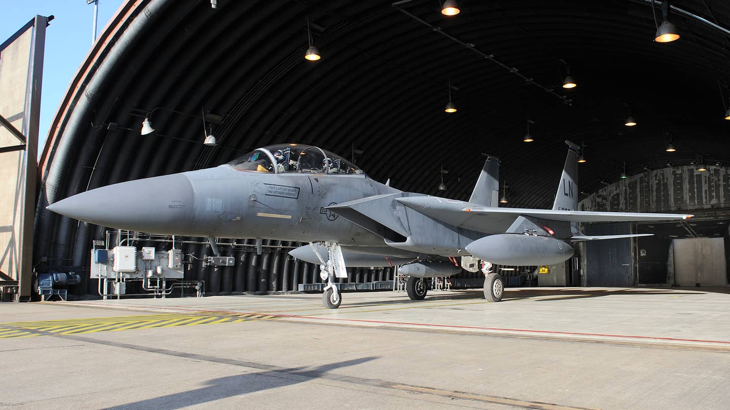 An F-15E from the 48th Fighter Wing taxies out with its CFTs removed. <em>Jamie Hunter</em>