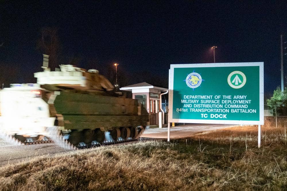 A Bradley Fighting Vehicle, among the first shipment of 109 promised to Ukraine, enters the gates of Transportation Core Dock in North Charleston, South Carolina. (U.S. Transportation Command photo by Oz Suguitan)
