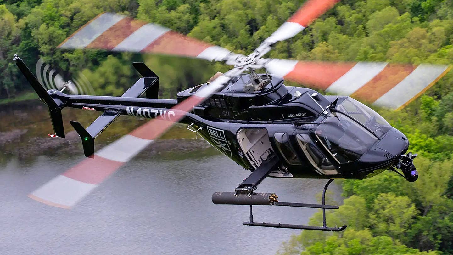 Bell 407 armed with rockets and a Wescam MX10 FLIR. <em>Bell </em>