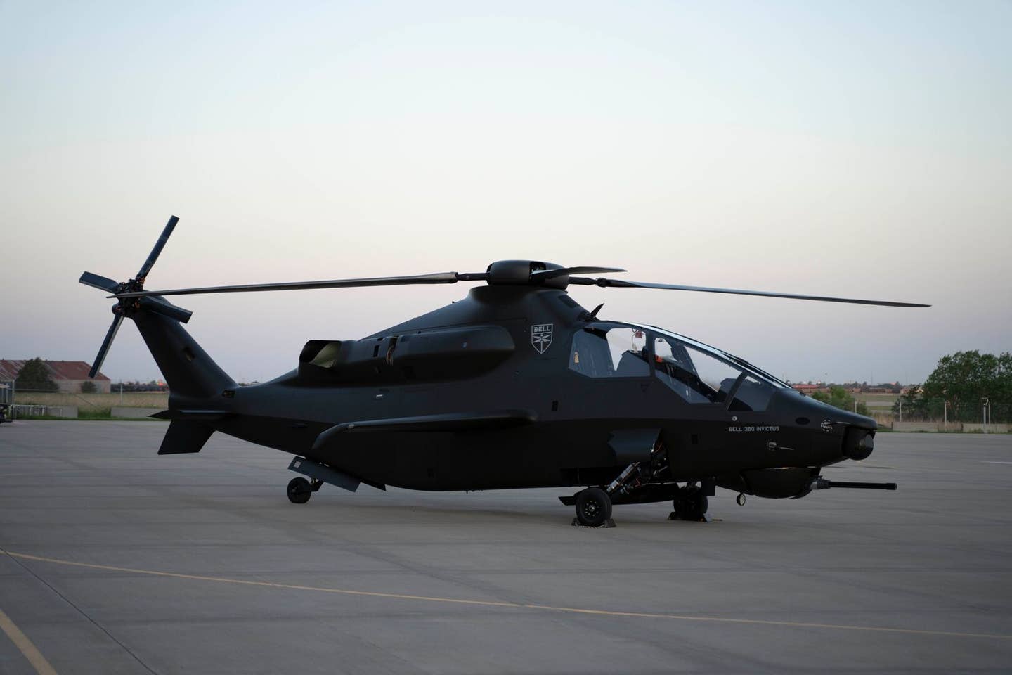 The single engine exhaust port is visible between the main rotor hub and tail. <em>Bell Photo</em>