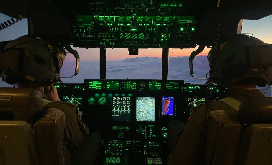 The view from the flight deck of a Royal Danish Air Force C-130J transport during a mission over Greenland. <em>Royal Danish Air Force</em>
