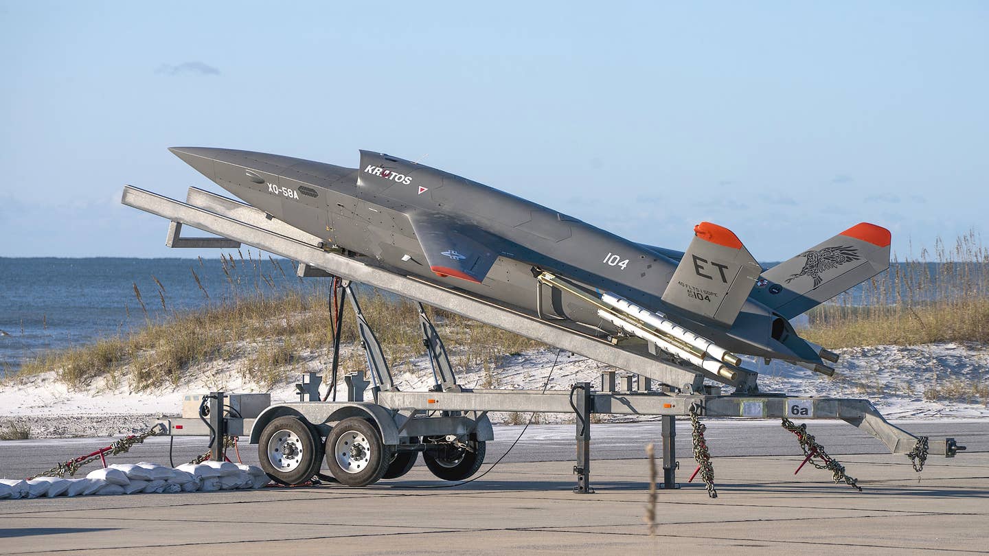 A US Air Force XQ-58A Valkyrie sits on its trailer-mounted launcher. <em>USAF</em>