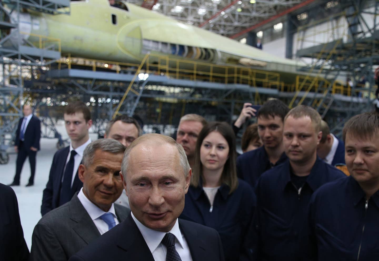 Russian President Vladimir Putin talks to workers during a visit to the Kazan Aircraft Production Association on May 13, 2019, in Kazan, Russia. <em>Photo by Mikhail Svetlov/Getty Images</em>