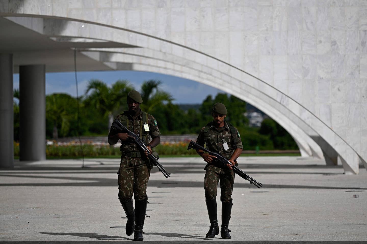 Soldiers on patrol in Brasilia on January 9, 2023, a day after supporters of the far-right ex-president Jair Bolsonaro invaded the Congress, Presidential Palace, and Supreme Court. <em>Photo by MAURO PIMENTEL/AFP via Getty Images</em>
