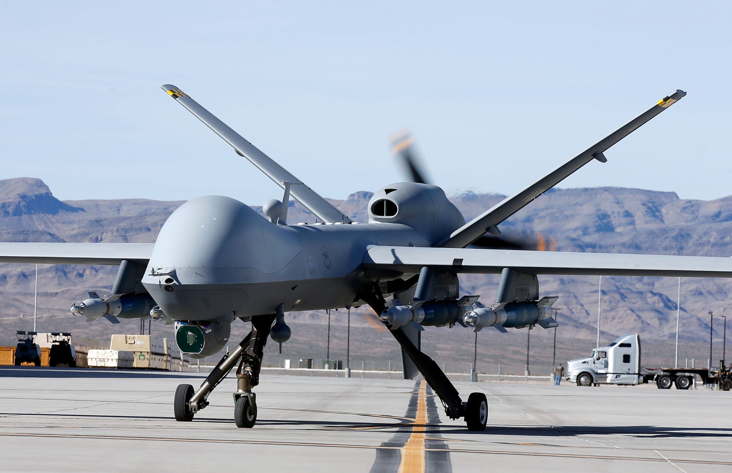 INDIAN SPRINGS, NV - NOVEMBER 17:  (EDITORS NOTE: Image has been reviewed by the U.S. Military prior to transmission.) An MQ-9 Reaper remotely piloted aircraft (RPA) taxis during a training mission at Creech Air Force Base on November 17, 2015 in Indian Springs, Nevada. The Pentagon has plans to expand combat air patrols flights by remotely piloted aircraft by as much as 50 percent over the next few years to meet an increased need for surveillance, reconnaissance and lethal airstrikes in more areas around the world.  (Photo by Isaac Brekken/Getty Images)