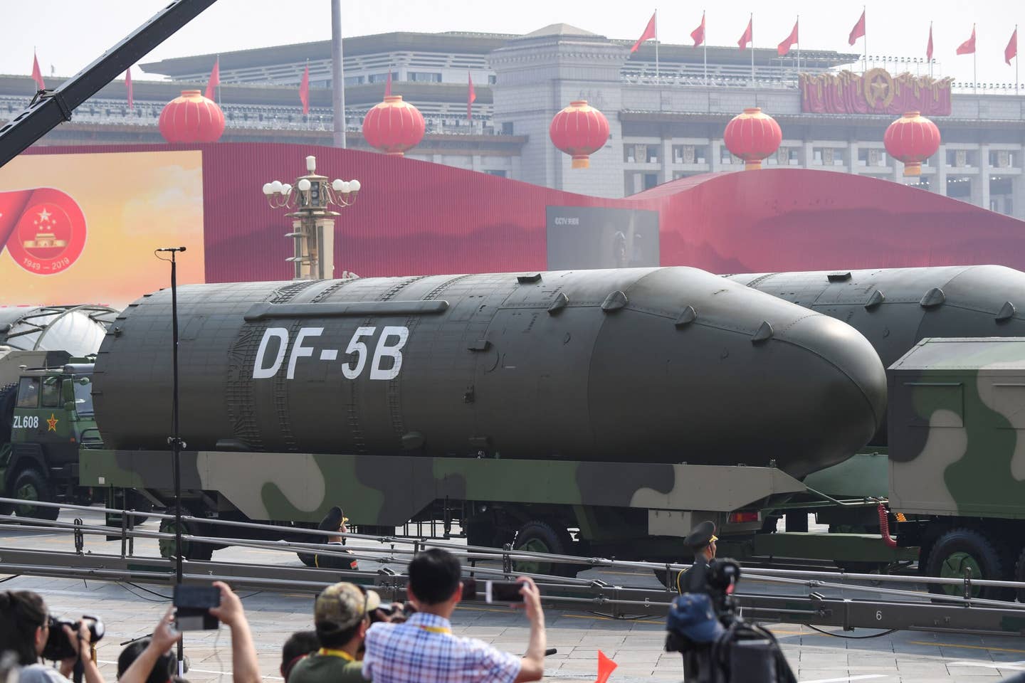 Military vehicles carrying DF-5B ICBMs participate in a military parade at Tiananmen Square in Beijing on October 1, 2019. <em>Credit: Photo by GREG BAKER/AFP</em>