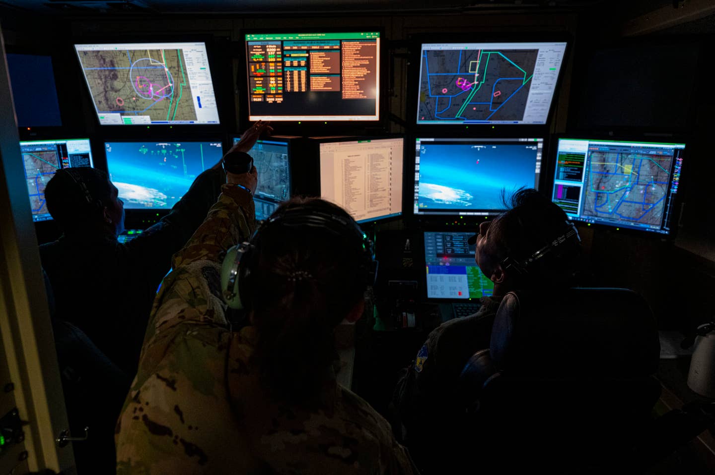 U.S. Air Force MQ-9 operators during a training flight in a ground control station, Holloman Air Force Base, New Mexico, Oct. 13, 2022. <em>Credit: U.S. Air Force photo by Airman 1st Class Isaiah Pedrazzini</em>