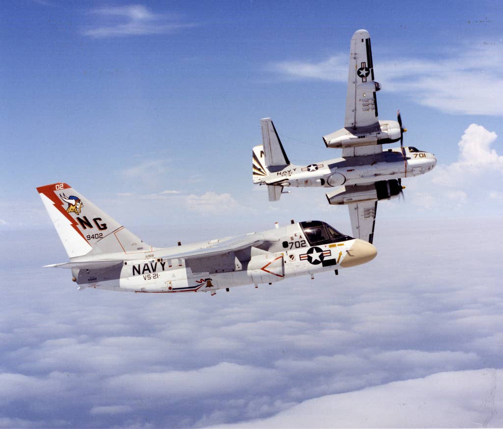 The end of one ASW era; the beginning of the next. An S-2 Tracker breaks away from its replacement: the new S-3A Viking. <em>U.S. Navy</em>