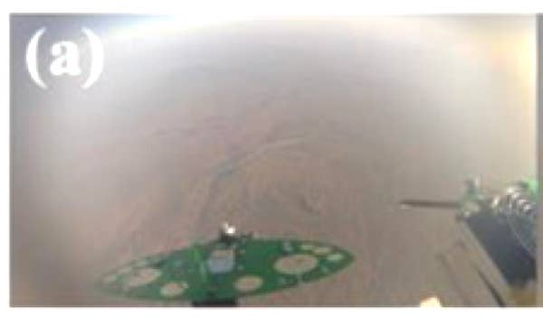 A low-resolution screen capture showing one of the drones tested in 2017 over Inner Mongolia. It appears to be an unpowered design made primarily from a printed circuit board. <em><em>Chinese Academy of Sciences</em> <em>via International Journal of Micro Air Vehicles</em></em>