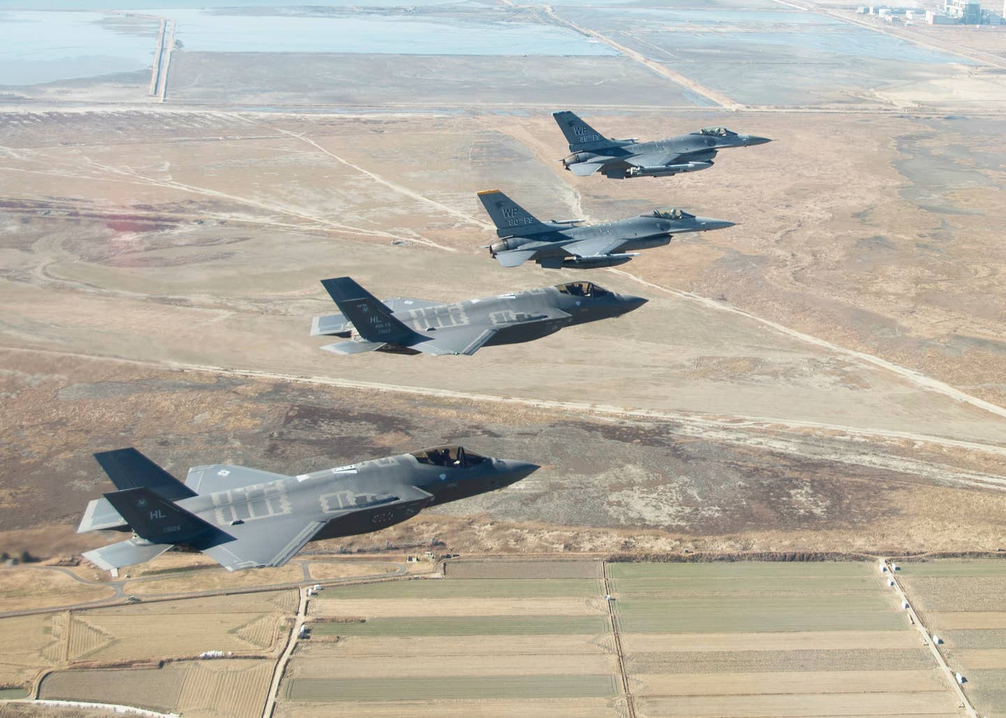 U.S. Air Force F-35As deployed from Hill Air Force Base, Utah, and F-16Cs from Kunsan Air Base, South Korea, participate in a training mission near Kunsan, in December 2017. <em>U.S. Air Force photo by Tech. Sgt. Josh Rosales</em>