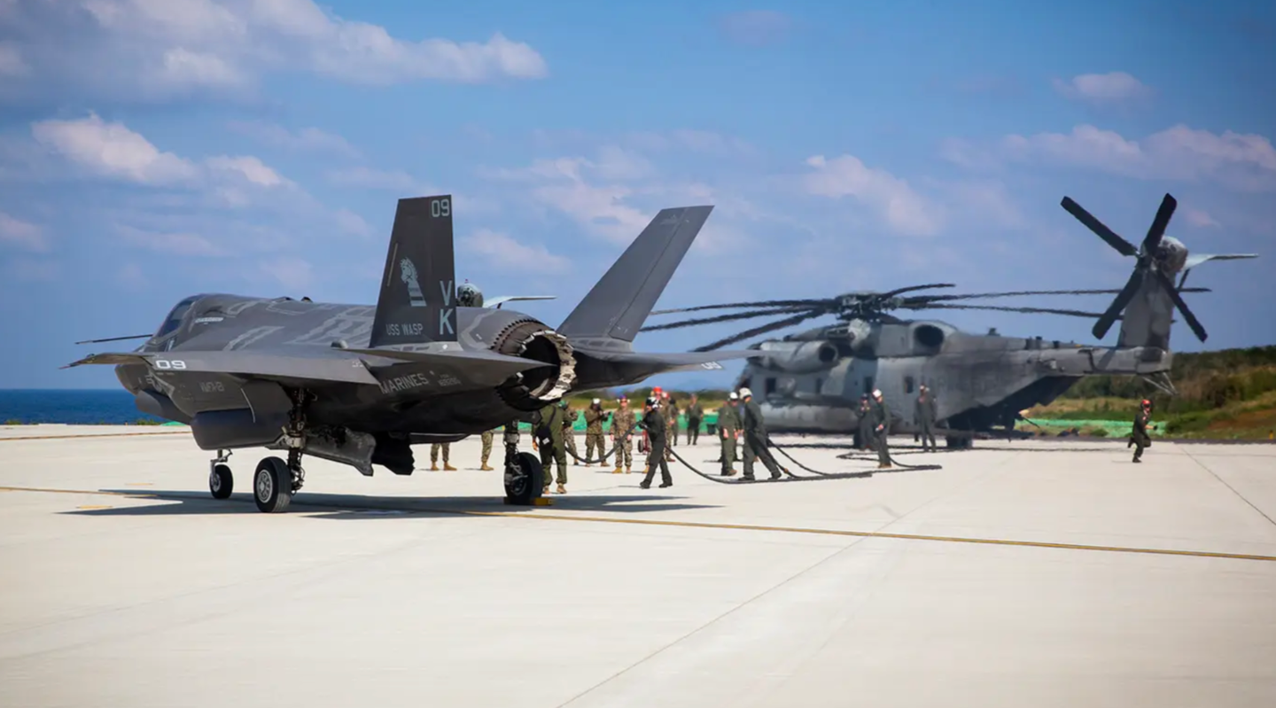 A U.S. Marine Corps F-35B is refueled from a CH-53E helicopter during an exercise at an austere location. <em>U.S. Department of Defense</em><br>