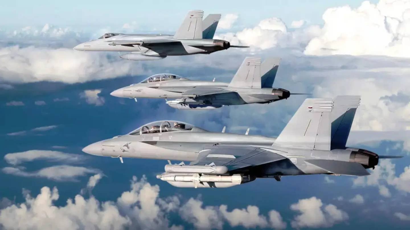 Boeing's Super Hornet family. Front to back: a single-seat F/A-18E, a two-seat F/A-18F, and an EA-18G. <em>Boeing</em>
