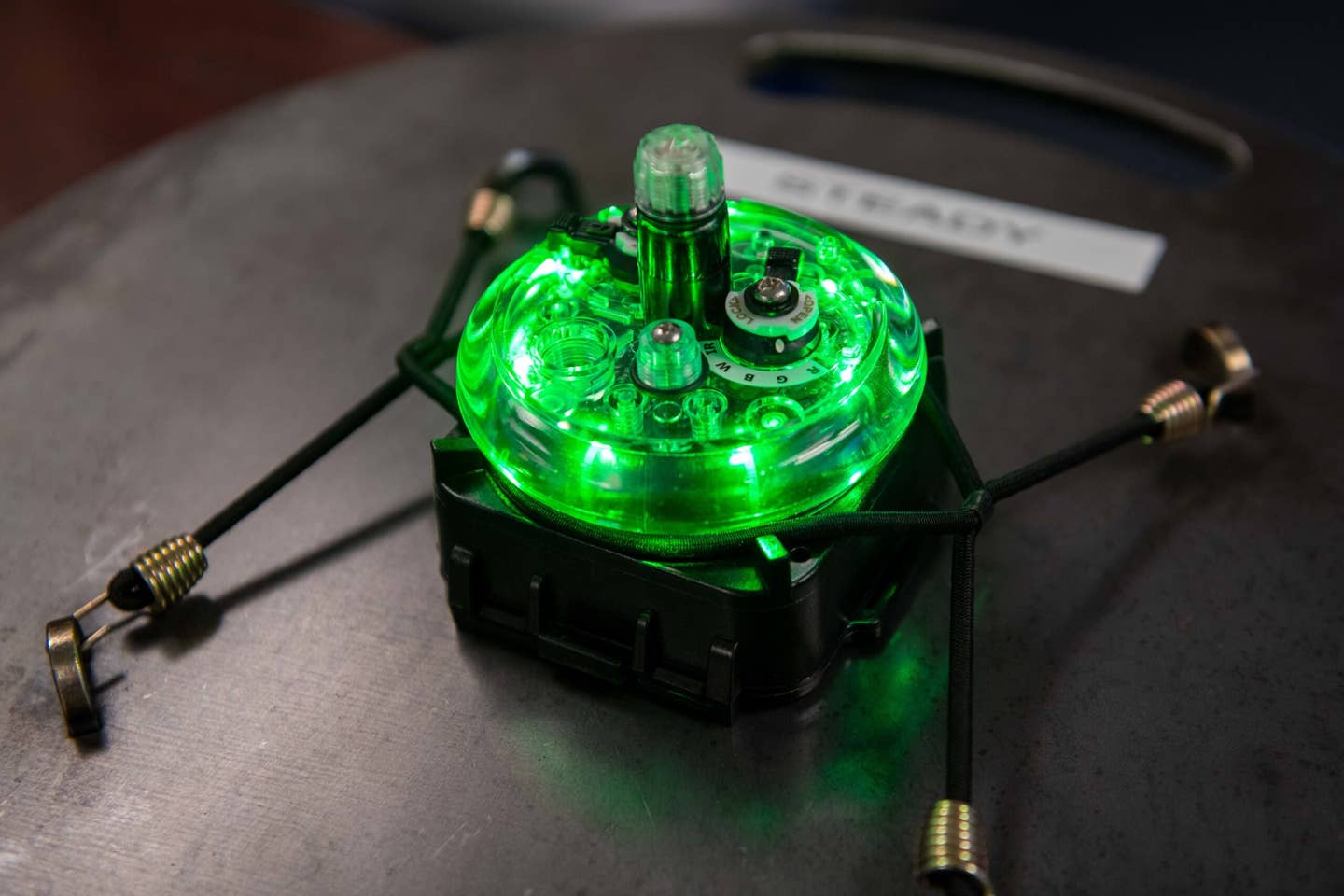 A Phantom ALZ-15 portable landing zone light designed by Phantom Products, Inc. These lights are small, lightweight, and can be quickly deployed as part of an AMP system to mark temporary landing zones for aircraft. <em>Credit: U.S. Air Force photo by Staff Sgt. Adam Goodly</em>