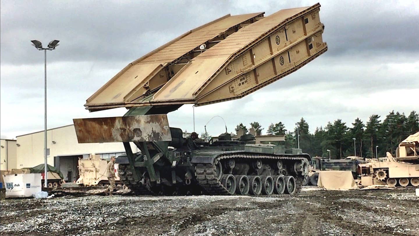 An M60 Armored Vehicle Launched Bridge with its bridge-launching mechanism partially raised. <em>US Army</em>