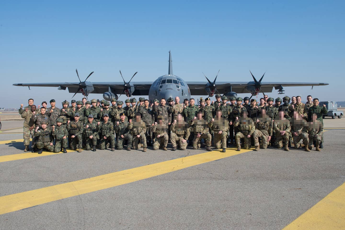 South Korean and U.S. special commandos pictured with USAF AC-130J after the precision-strike drill. <em>South Korea Joint Chiefs of Staff</em>
