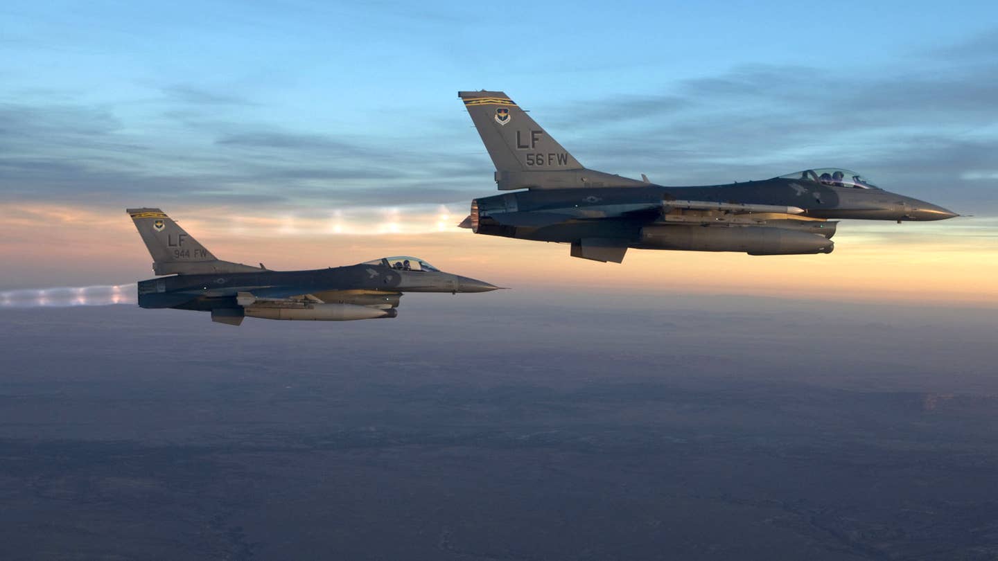 A pair of F-16 Viper fighter jets assigned to the US Air Force's 56th Fighter Wing at Luke Air Force Base in Arizona. <em>USAF</em>