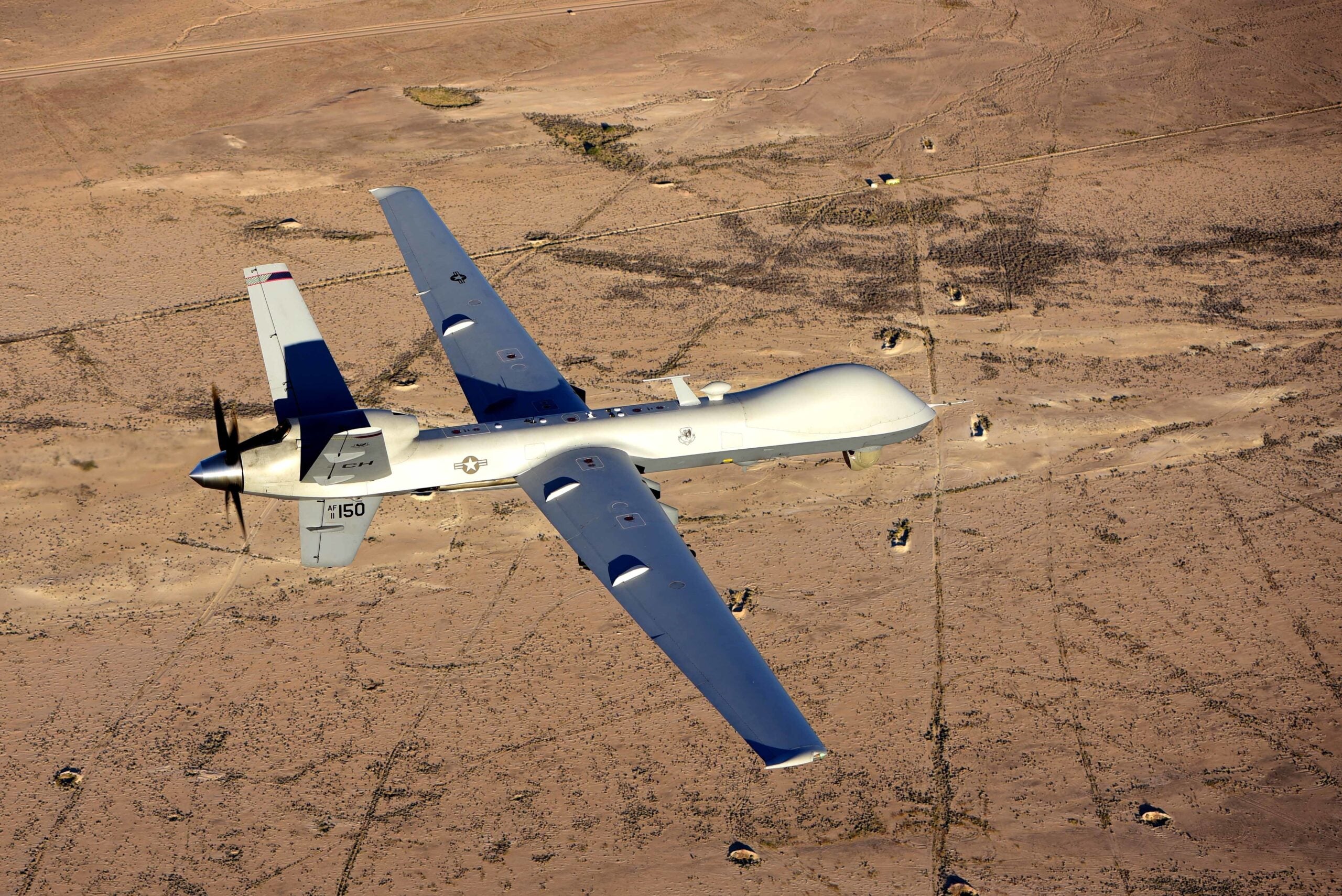 An MQ-9 Reaper flies a training mission over the Nevada Test and Training Range, July 15, 2019. MQ-9 aircrew provide dominant, persistent attack and reconnaissance for comabtant commanders and coalition partners across the globe. (U.S. Air Force photo by Airman 1st Class William Rio Rosado)