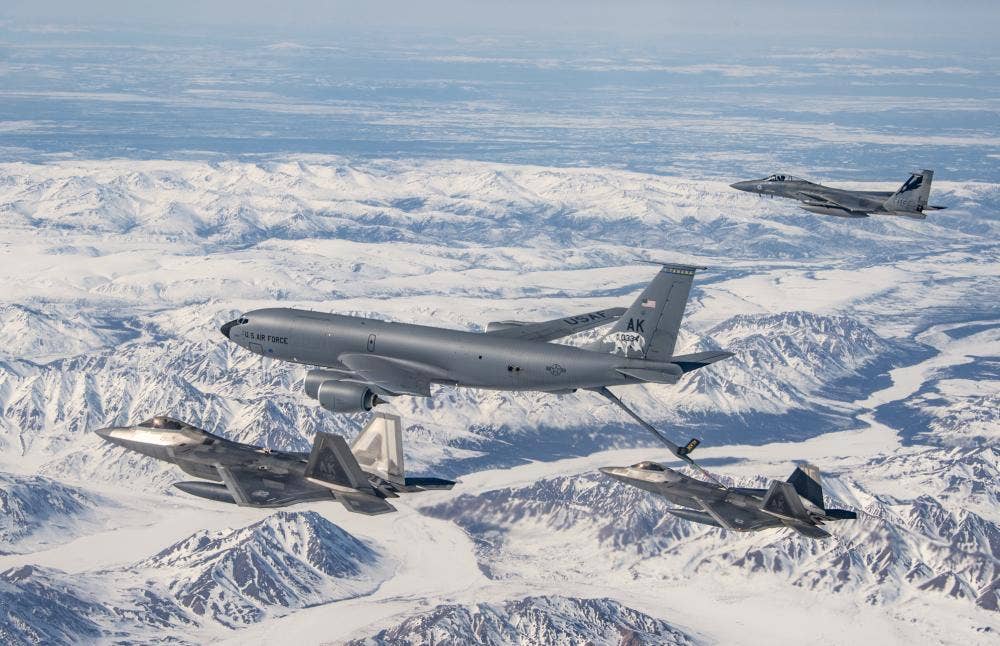 Alaskan F-22As and Californian F-15Cs train for air policing duties over Alaska. (USAF)