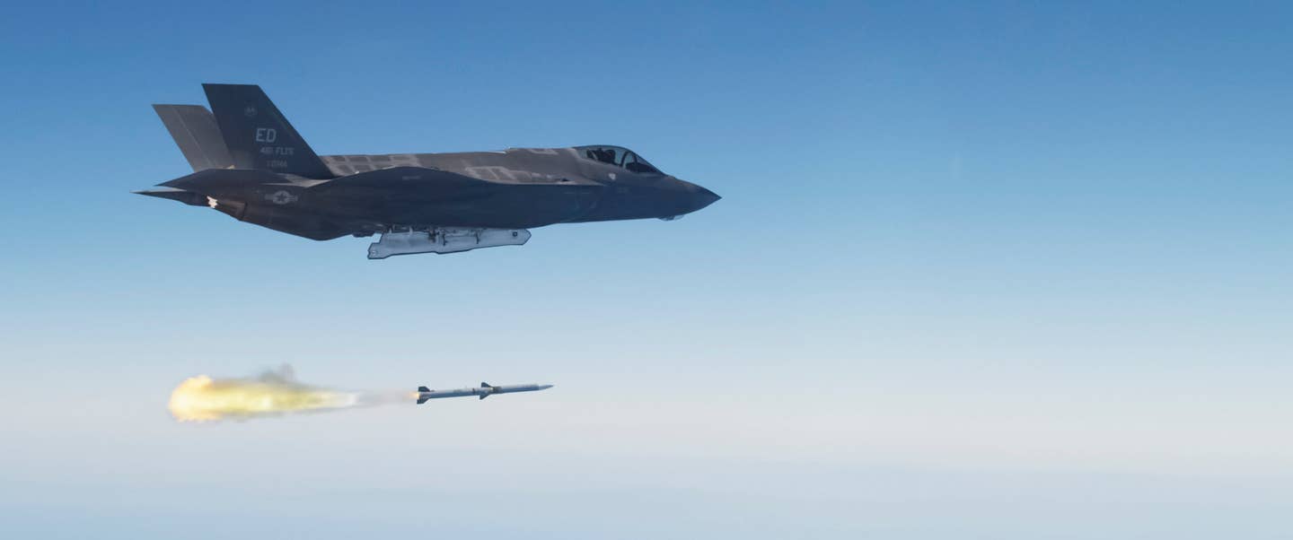 An F-35 Lightning II launches an AIM-120 advanced medium-range air-to-air missile (AMRAAM) over a military test range off the California coast. The AMRAAM was fired from an F-35A (AF-6) conventional take-off and landing (CTOL) variant fighter operating from the F-35 Integrated Test Facility at Edwards Air Force Base, Calif. (U.S. Navy photo courtesy of Lockheed Martin by Paul Weatherman/Released)