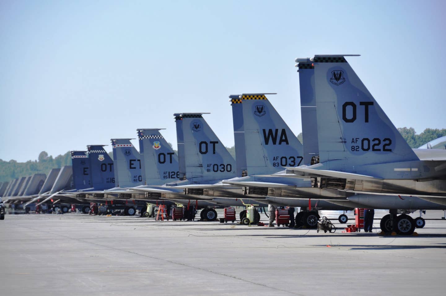 F-15Cs, F-15Es, and F-22s line the ramp at Joint Base Elmendorf-Richardson. (U.S. Air Force photo/Capt. Tania Bryan)