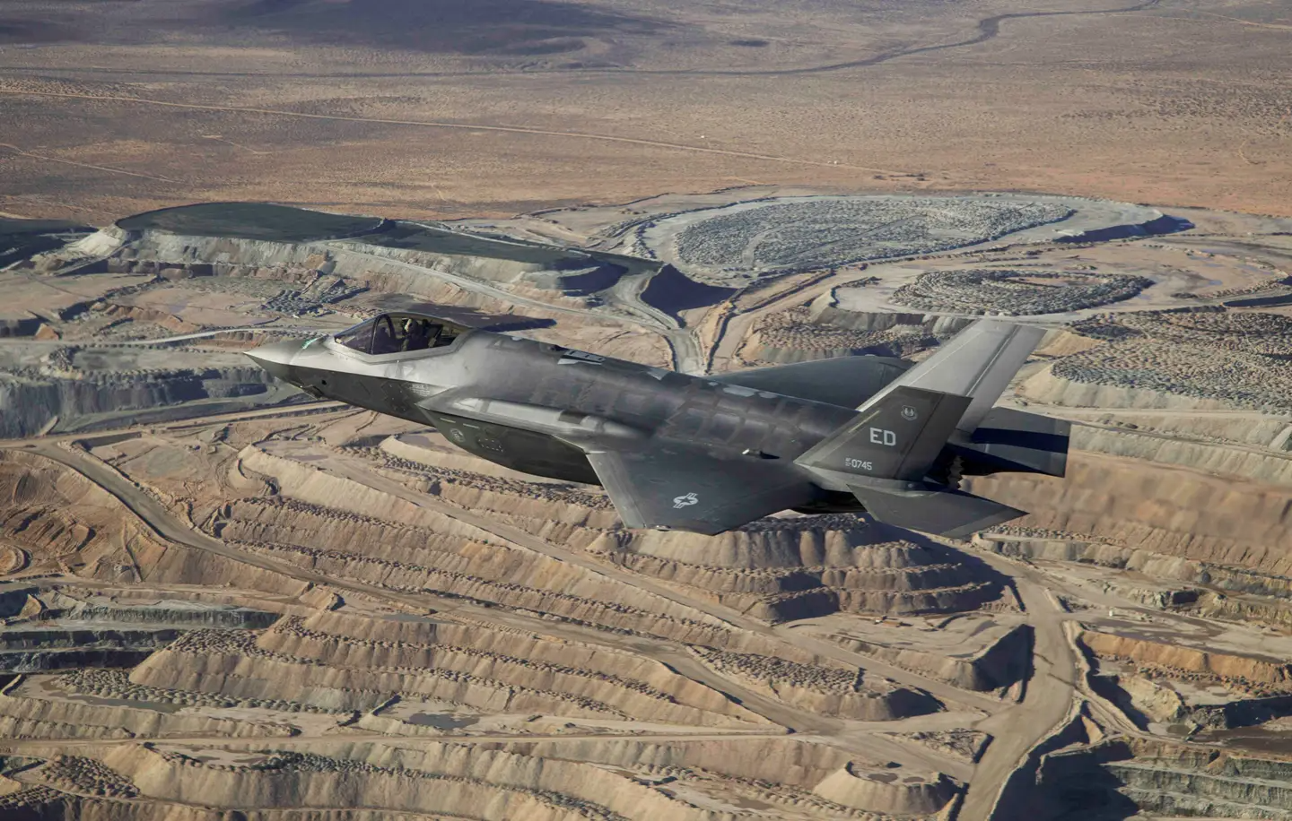 An F-35A conducts its first flight with its TR-3 backbone above the Mojave Desert in California on January 6, 2023.&nbsp;<em>Credit: F-35 JPO</em>