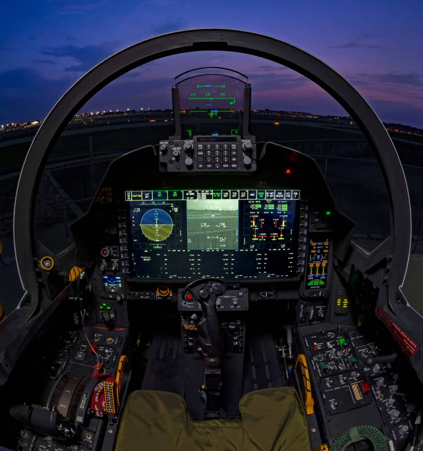 F-15EX front cockpit with its wide-area display. The same setup is duplicated in the back, but the aircraft will normally fly with just a pilot. (Boeing)
