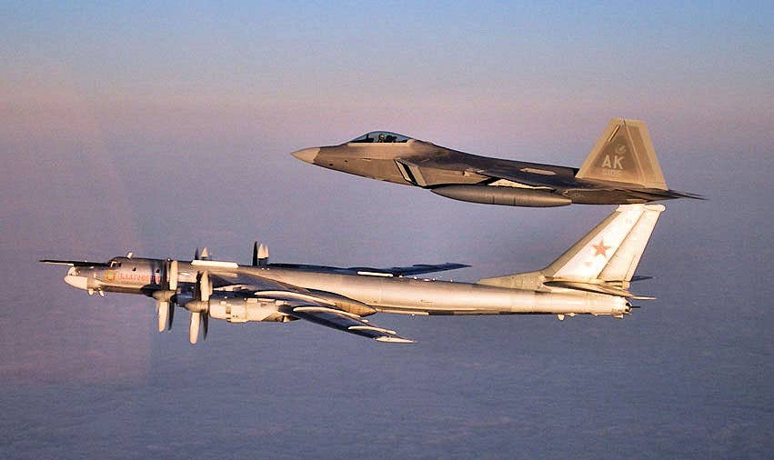 An F-22A based in Alaska intercepts a Tu-95. (USAF)