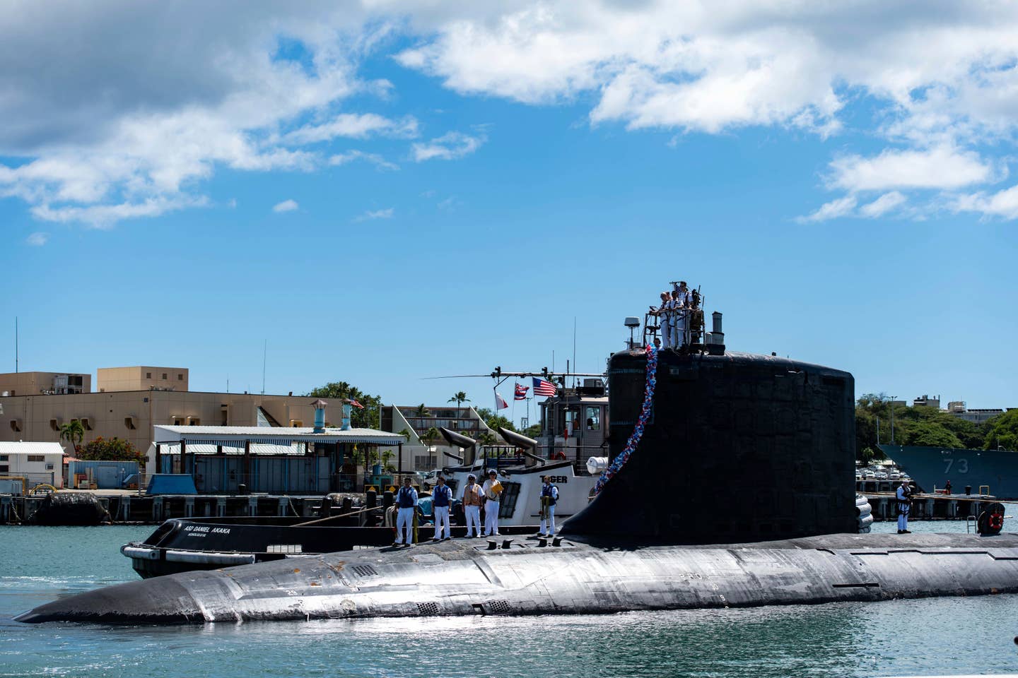 The Virginia-class fast-attack submarine USS Illinois (SSN 786) returns home to Joint Base Pearl Harbor-Hickam from a deployment in the 7th Fleet area of responsibility on Sept. 13, 2021. (Mass Communication Specialist 1st Class Michael B. Zingaro/U.S. Navy via AP)