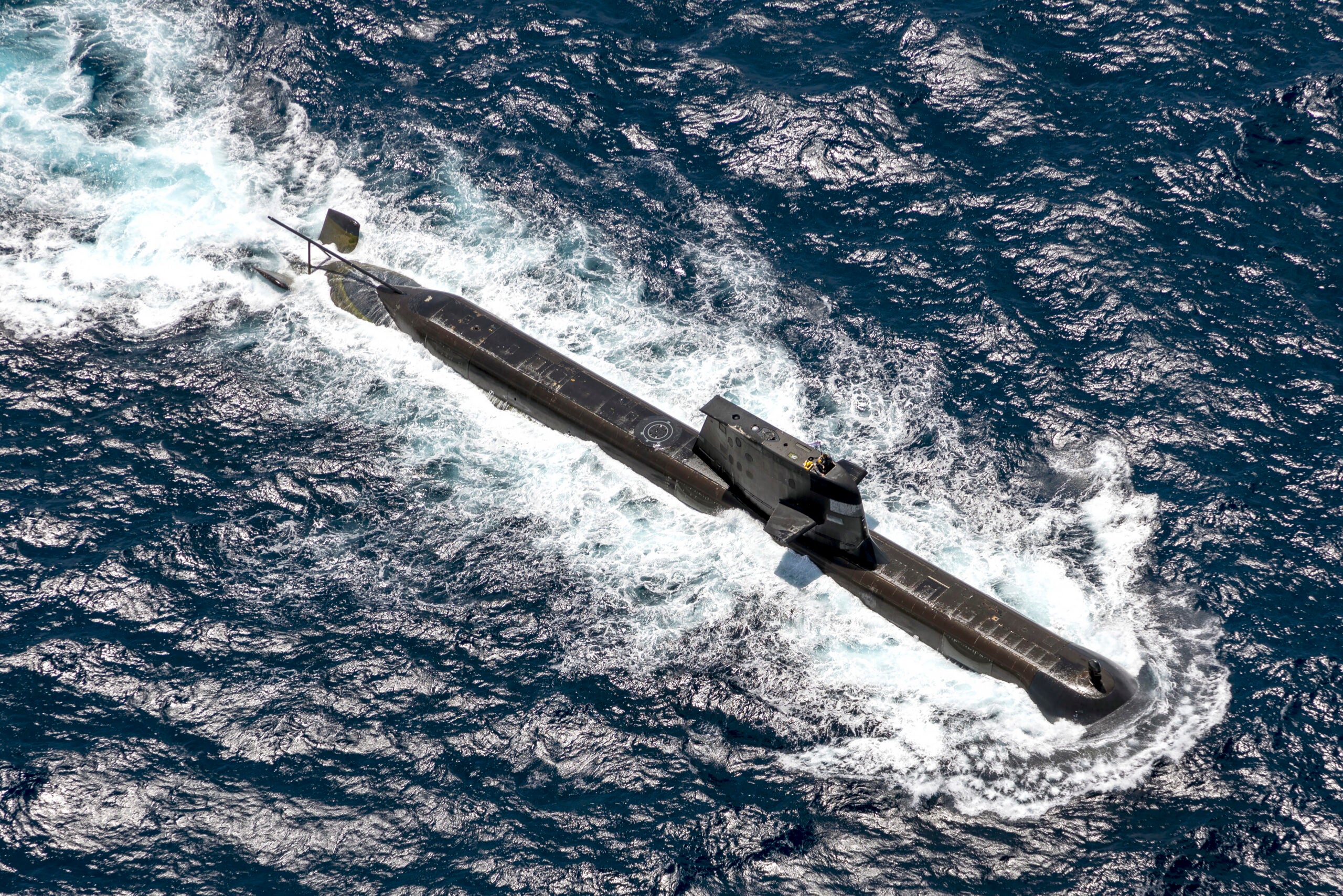 DARWIN, AUSTRALIA - SEPTEMBER 05: In this handout image provided by the Australian Defence Force, Royal Australian Navy submarine HMAS Rankin is seen during AUSINDEX 21, a biennial maritime exercise between the Royal Australian Navy and the Indian Navy on September 5, 2021 in Darwin, Australia. Australia, the United States and the United Kingdom have announced a new strategic defence partnership - known as AUKUS - to build a class of nuclear-propelled submarines and work together in the Indo-Pacific region. The new submarines will replace the Royal Australian Navy's existing Collins submarine fleet. (Photo by POIS Yuri Ramsey/Australian Defence Force via Getty Images)