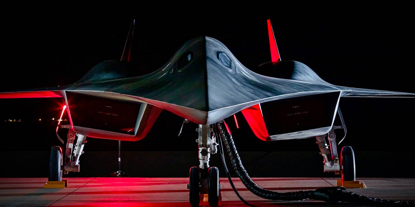 Lockheed Martin's Darkstar illuminated in red