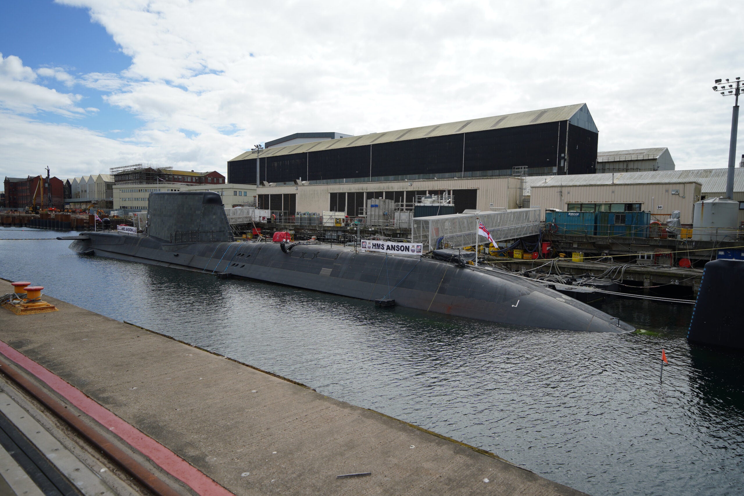 HMS Anson docked at BAE systems in Barrow-in-Furness before it is officially commissioned into the Royal Navy, as the UK's newest Astute-Class attack submarine, during a visit by Prime Minister Boris Johnson, Defence Secretary Ben Wallace and new Australian Deputy Prime Minister Richard Marles. Picture date: Wednesday August 31, 2022. (Photo by Peter Byrne/PA Images via Getty Images)