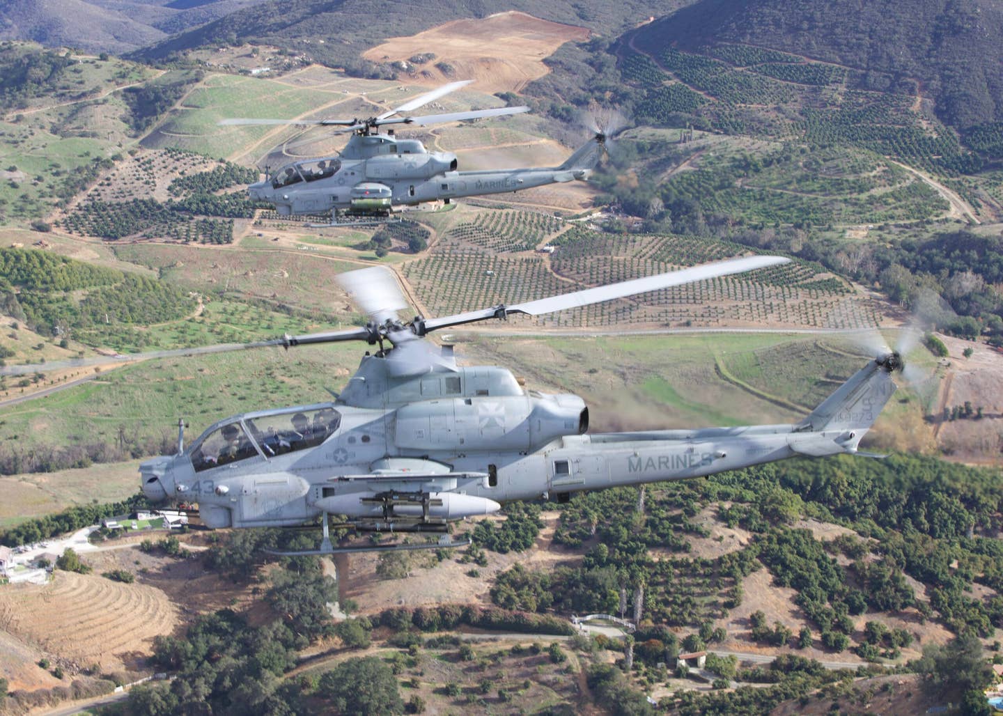 A section of AH-1Zs on a training mission. (Author)