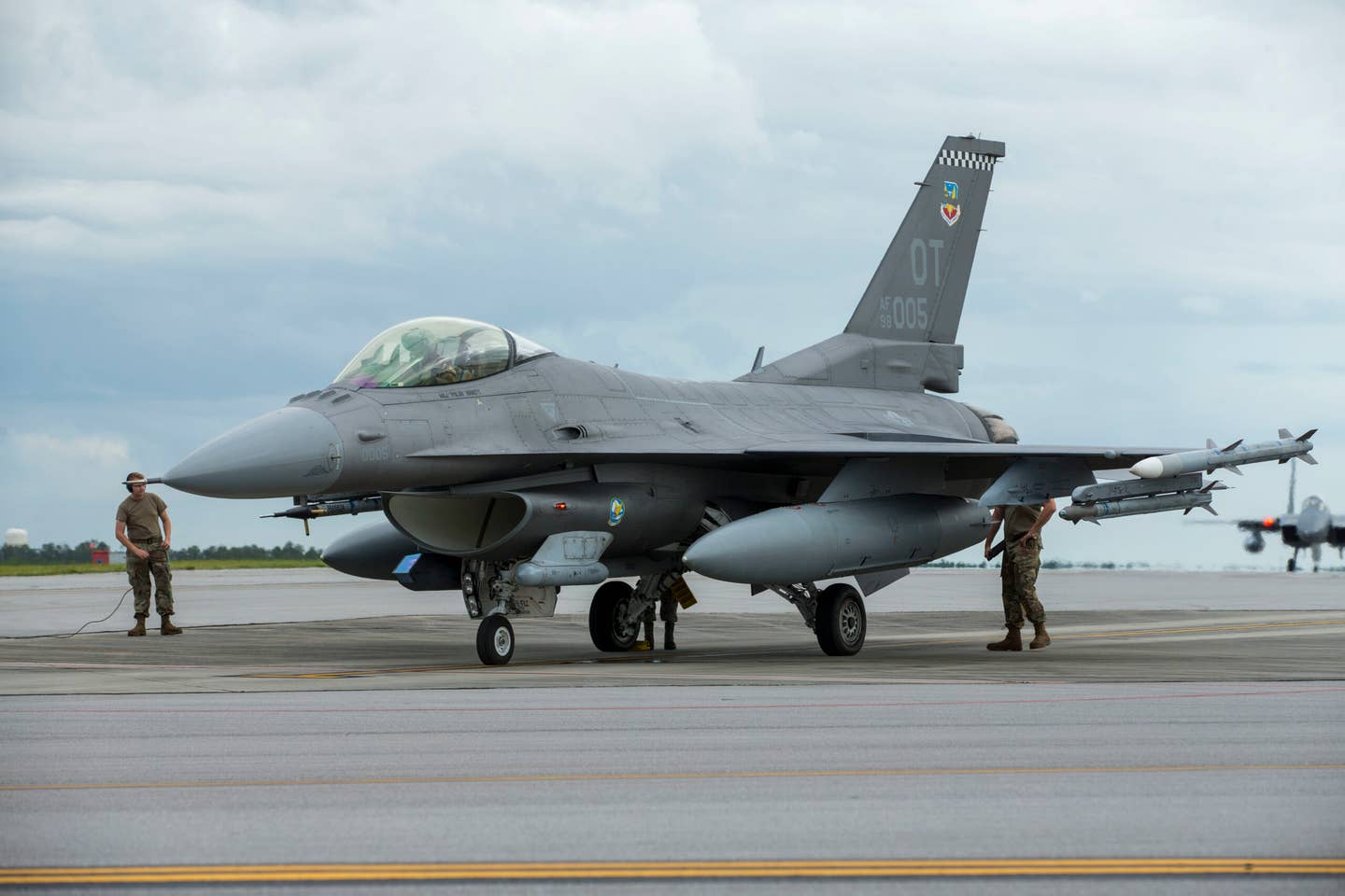 Maintainers from the 96th Test Wing prepare an F-16 Fighting Falcon for a flight test with its new APG-83 Active Electronically Scanned Array radar at Eglin Air Force Base. <em>Credit: U.S. Air Force photo by Master Sgt. Tristan McIntire</em>