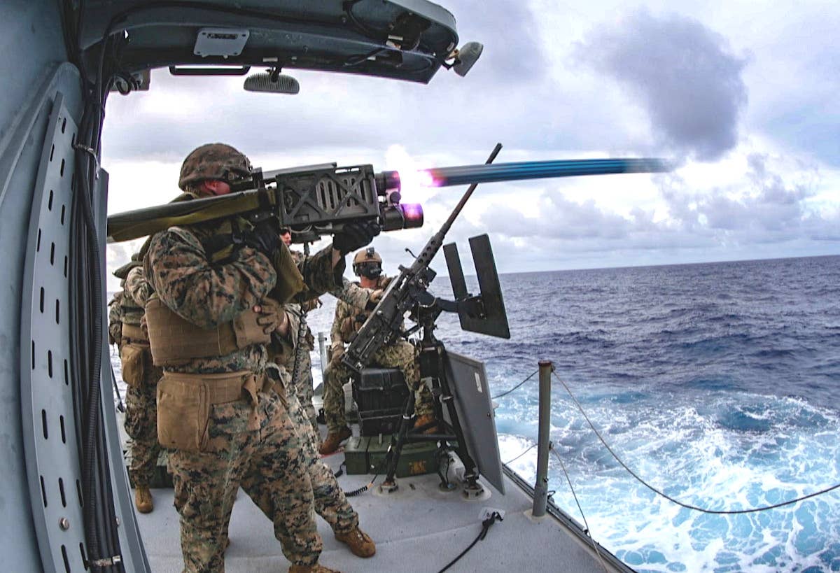 A Marine fires a Stinger missile from a US Navy Mk VI patrol boat. <em>USN</em>