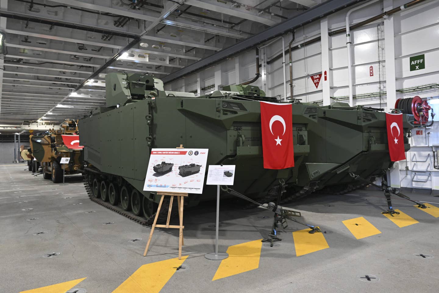 Armored Amphibious Assault Vehicles are seen in the hangar of TCG <em>Anadolu</em> after the ceremony. <em>Credit: Photo by Serhat Cagdas/Anadolu Agency via Getty Images</em>