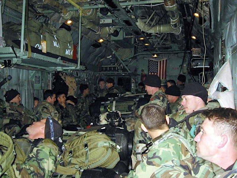 Army Green Berets inside an MC-130H during Operation Ugly Baby. <em>US Army</em>