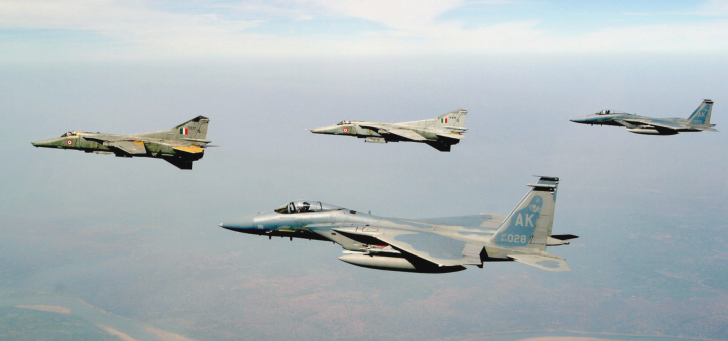 IAF MiG-27s and U.S. Air Force F-15Cs fly together during Cope India 2004.&nbsp;<em>USAF</em>